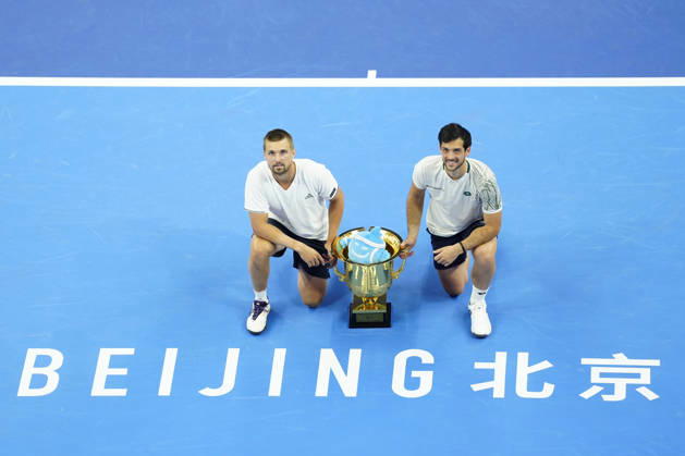 October 6, 2026, Beijing, China: Julian Cash and Lloyd Glasspool of Great Britain pose with their winner s trophy during the medal ceremony after winning against Sander Arends and David Pel of Netherlands (not in view) during the Men s Doubles final match on day seven of China Open at the National Tennis Center. Julian Cash and Lloyd Glasspool won, Final Score: 6-3, 3-6, 10-6 2026 China Open In Beijing - 06 Oct 2026  - ZUMAs197 20261006_aaa_s197_267 Copyright: xPolyxFeix