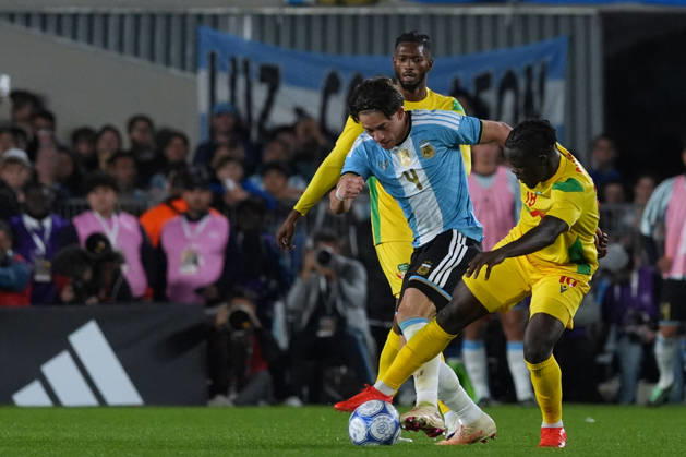 Messi bade farewell to Argentina in the friendly match against Benin BUENOS AIRES, ARGENTINA - OCTOBER 6: Agustín Giay (4) of Argentina in action during the friendly match between Argentina and Benin in Buenos Aires, Argentina on October 6, 2026. Argentine football legend and national team, Nationalteam captain Lionel Messi goodbye to the crowd during his farewell match in front of over 80,000 spectators at the Monumental Stadium. Argentine football star Lionel Messi played his final international match, Länderspiel, Nationalmannschaft in the friendly game between Argentina and Benin. The 39-year-old walk onto the stadium pitch for the final time in the sky-blue and white jersey, entering his farewell as Argentina s record appearance-maker and leading scorer with 207 caps and 125 goals. Luciano Gonzalez Anadolu Buenos Aires Argentina. Editorial use only. Please get in touch for any other usage.  Copyright: x2026xAnadoluxLucianoxGonzalezx