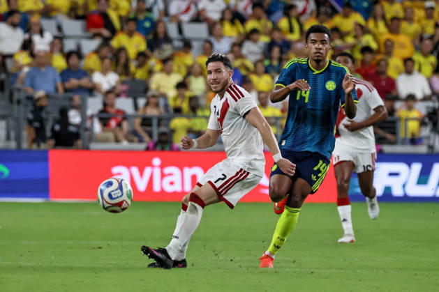 MIAMI, FL - OCTOBER 06: Jhon Solis 14 of Colombia and Adrian Ugarriza 7 of Peru battle for a ball during an International Friendly, Länderspiel, Nationalmannschaft soccer match between Colombia and Peru at NU Stadium on October 06, 2026 in Miami, Florida.(Photo by Chris Arjoon Icon Sportswire) SOCCER: OCT 06 Colombia vs Peru EDITORIAL USE ONLY Icon2610060000029