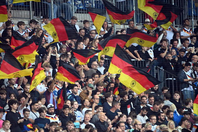 German fans with their flags, feature, background image, symbolic photo, international soccer match, U21, European Championship qualifier, Germany vs. Georgia 2–0 on October 6, 2026, Schüco Arena, Bielefeld, Â