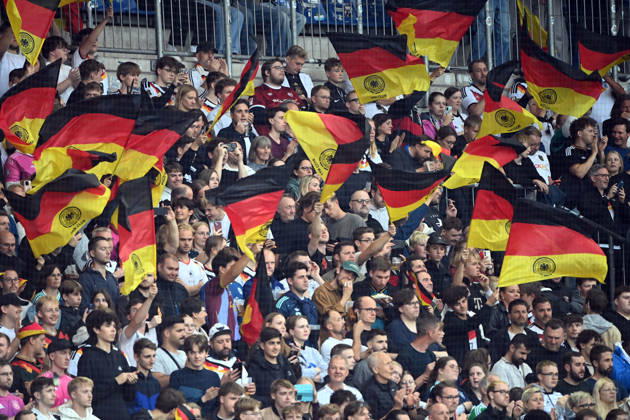 German fans with their flags, feature, background image, symbolic photo, international soccer match, U21, European Championship qualifier, Germany vs. Georgia 2–0 on October 6, 2026, Schüco Arena, Bielefeld, Â