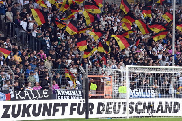 German fans with their flags, feature, background image, symbolic photo, international soccer match, U21, European Championship qualifier, Germany vs. Georgia 2–0 on October 6, 2026, Schüco Arena, Bielefeld, Â