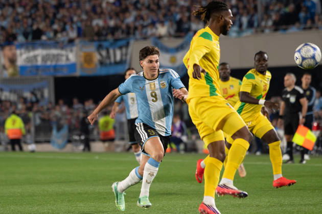 BUENOS AIRES, ARGENTINA 6 OCTOBER: Argentine footballer Julian Alvarez tries to retrieve the ball during a friendly match between Argentina and Benin at the Estadio Monumental Antonio V. Liberti on 6 October 2026 in Buenos Aires, Argentina.  Copyright: xMBxMediax