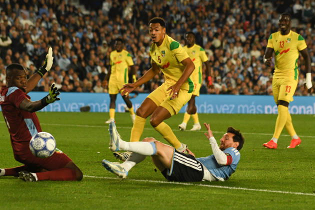 BUENOS AIRES, ARGENTINA 6 OCTOBER: Argentine player Lionel Messi comes very close to scoring a goal, but Benin goalkeeper Marcel Dandjinou makes the save, whilst midfielder Yohan Roche looks on, during a friendly match between Argentina and Benin at the Estadio Monumental Antonio V. Liberti on 6 October 2026 in Buenos Aires, Argentina. Copyright: xMBxMediax