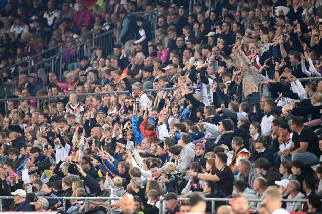 Spectators doing the LA Ola wave, laola, feature, background image, symbolic photo, cheering, joy, cheers, international soccer match, U21, European Championship qualifier, Germany vs. Georgia 2–0 on October 6, 2026, Schueco Arena, Bielefeld, Â