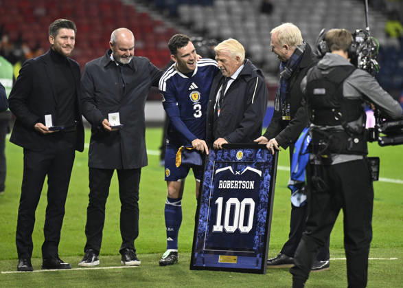 Glasgow, Scotland, 6th October 2026. Scotland head coach, Sebastien Pocognoli with former Scotland & Andy Robertsons managers Steve Clarke, Gordon Strachan and Alex McLeish wait to present a framed shiirt to mark Roberstons 100 cap during the Scotland vs Slovenia UEFA Nations League match at Hampden Park, Glasgow. Picture credit should read: Neil Hanna Sportimage EDITORIAL USE ONLY. No use with unauthorised audio, video, data, fixture lists, club league logos or live services. Online in-match use limited to 120 images, no video emulation. No use in betting, games or single club league player publications. SPI_097_NH_Scotland_Slovenia SPI-5054-0097