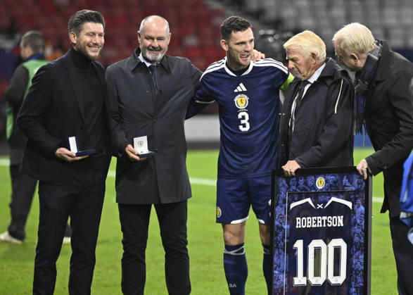 Glasgow, Scotland, 6th October 2026. Scotland head coach, Sebastien Pocognoli with former Scotland & Andy Robertsons managers Steve Clarke, Gordon Strachan and Alex McLeish wait to present a framed shiirt to mark Roberstons 100 cap during the Scotland vs Slovenia UEFA Nations League match at Hampden Park, Glasgow. Picture credit should read: Neil Hanna Sportimage EDITORIAL USE ONLY. No use with unauthorised audio, video, data, fixture lists, club league logos or live services. Online in-match use limited to 120 images, no video emulation. No use in betting, games or single club league player publications. SPI_095_NH_Scotland_Slovenia SPI-5054-0095