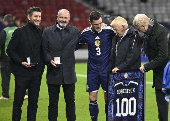Glasgow, Scotland, 6th October 2026. Scotland head coach, Sebastien Pocognoli with former Scotland & Andy Robertsons managers Steve Clarke, Gordon Strachan and Alex McLeish wait to present a framed shiirt to mark Roberstons 100 cap during the Scotland vs Slovenia UEFA Nations League match at Hampden Park, Glasgow. Picture credit should read: Neil Hanna Sportimage EDITORIAL USE ONLY. No use with unauthorised audio, video, data, fixture lists, club league logos or live services. Online in-match use limited to 120 images, no video emulation. No use in betting, games or single club league player publications. SPI_096_NH_Scotland_Slovenia SPI-5054-0096