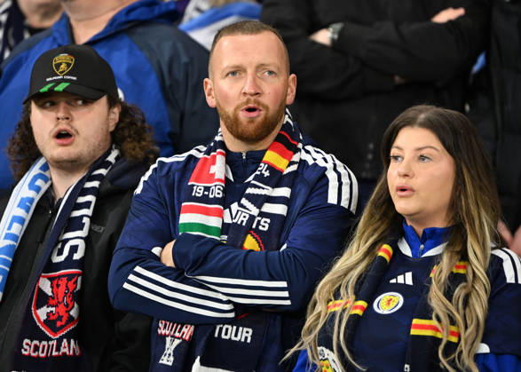Glasgow, Scotland, 6th October 2026. Scotland fans during the Scotland vs Slovenia UEFA Nations League match at Hampden Park, Glasgow. Picture credit should read: Neil Hanna Sportimage EDITORIAL USE ONLY. No use with unauthorised audio, video, data, fixture lists, club league logos or live services. Online in-match use limited to 120 images, no video emulation. No use in betting, games or single club league player publications. SPI_118_NH_Scotland_Slovenia SPI-5054-0118