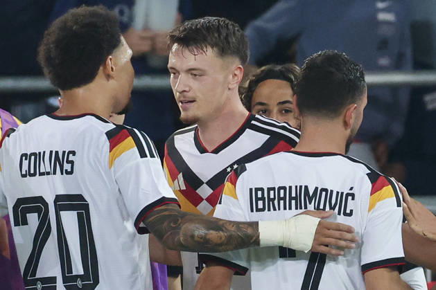 Dzenan Pejcinovic (Germany) celebrates after scoring his team s second goal alongside Nnamdi Collins (Germany) and Arijon Ibrahimovic (Germany) during the UEFA Under-21 EURO qualifier between Germany U21 and Georgia U21 at Almstadion on October 6, 2026 in Bielefeld, Germany. Photo by Marco Steinbrenner, DeFodi Images