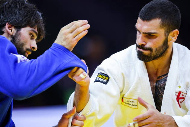 AZERBAIJAN, BAKU - OCTOBER 7, 2026: Zelim Tckaev (R) of Azerbaijan and Tato Grigalashvili of Georgia compete in their -81 kg bout as part of the 2026 World Judo Championships at the National Gymnastics Arena. Mikhail Sinitsyn TASS 98916216