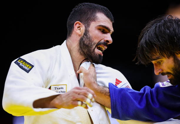 AZERBAIJAN, BAKU - OCTOBER 7, 2026: Zelim Tckaev (L) of Azerbaijan and Tato Grigalashvili of Georgia compete in their -81 kg bout as part of the 2026 World Judo Championships at the National Gymnastics Arena. Mikhail Sinitsyn TASS  98916224