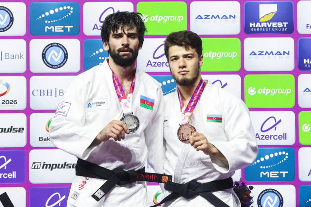 AZERBAIJAN, BAKU - OCTOBER 7, 2026: 2nd placed Zelim Tckaev of Azerbaijan and 3rd placed Omar Radzhabli of Azerbaijan pose during an award ceremony for the men s -81 kg category during the 2026 World Judo Championships at the National Gymnastics Arena. Mikhail Sinitsyn TASS 98918409