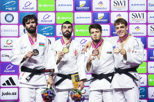 AZERBAIJAN, BAKU - OCTOBER 7, 2026: 2nd placed Zelim Tckaev of Azerbaijan, 1st placed Tato Grigalashvili of Georgia, 3rd placed Omar Radzhabli of Azerbaijan and Mihajlo Simin (L-R) of Serbia pose during an award ceremony for the men s -81 kg category during the 2026 World Judo Championships at the National Gymnastics Arena. Mikhail Sinitsyn TASS 98918406