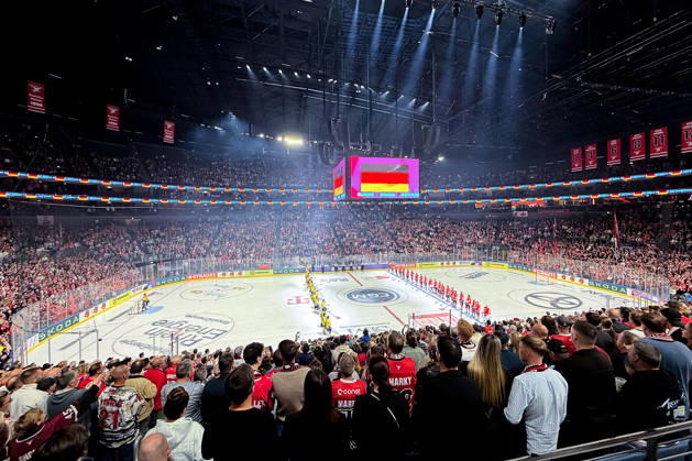 October 7, 2026, Ice Hockey, CHL, Kölner Haie vs. Blue Fox Herning, Champions Hockey League 2026–27, Matchday 5, 2026–27 Season, Lanxess Arena Cologne—Interior Overview, Overview Image of the Venue’s Interior, The teams gathered together for the national anthem of North Rhine-Westphalia, Germany