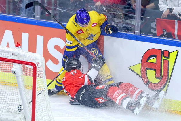 October 7, 2026, Ice Hockey, CHL, Kölner Haie vs. Blue Fox Herning, Champions Hockey League 2026–27, Matchday 5, 2026–27 Season, Lanxess Arena, Cologne: Lukas Bang of Blue Fox Herning (No. 29) battles Luca Münzenberger of the Kölner Haie (No. 75) in North Rhine-Westphalia, Germany