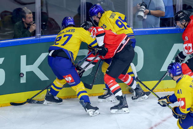 October 7, 2026, Ice Hockey, CHL, Kölner Haie vs. Blue Fox Herning, Champions Hockey League 2026–27, Matchday 5, 2026–27 Season, Lanxess Arena, Cologne: Marco Münzenberger of the Kölner Haie 65 battles Oskars Cibulskis of Blue Fox Herning 27 and Artturi Mikael Toivola of Blue Fox Herning 95; North Rhine-Westphalia, Germany