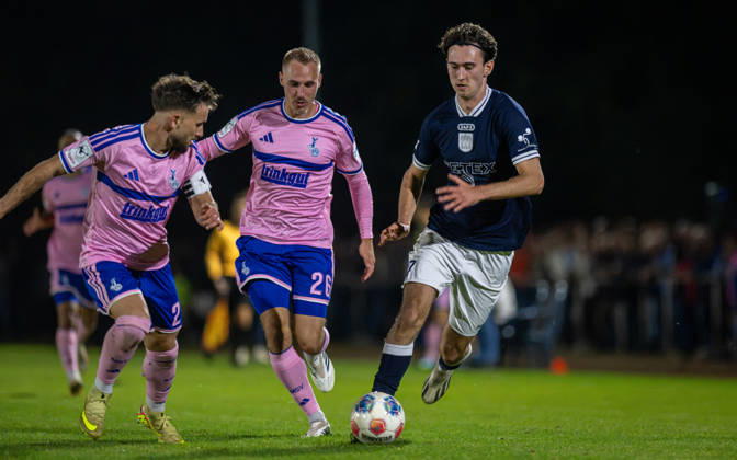 Soccer, 2026–2027 Season, Lower Rhine Cup, October 7, 2026, Round 3, Men’s, BW Dingden Blue vs. MSV Duisburg Pink; from left: Can Coskun (MSV Duisburg), Florian Krueger (MSV Duisburg), Max Mahn (BW Dingden); Hamminkeln Sports Field, BW Dingden, North Rhine-Westphalia, Germany 261007_fb_bw-dingden_msv-duisburg_61286
