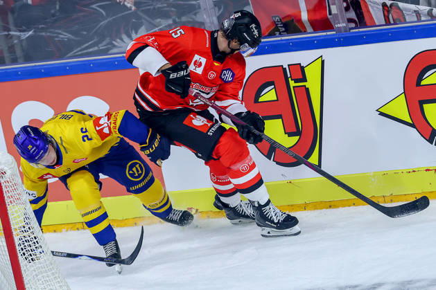 October 7, 2026, Ice Hockey, CHL, Kölner Haie vs. Blue Fox Herning, Champions Hockey League 2026–27, Matchday 5, 2026–27 Season, Lanxess Arena, Cologne; Louis Marc Aubry of the Kölner Haie battles Valdemar Bilgrav of Blue Fox Herning; 26, North Rhine-Westphalia, Germany