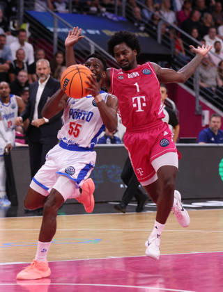 Childe Dundao of Porto with the ball against John Michael Wright of Bonn, BCL, Telekom Baskets Bonn vs. FC Porto, Bonn, October 7, 2026