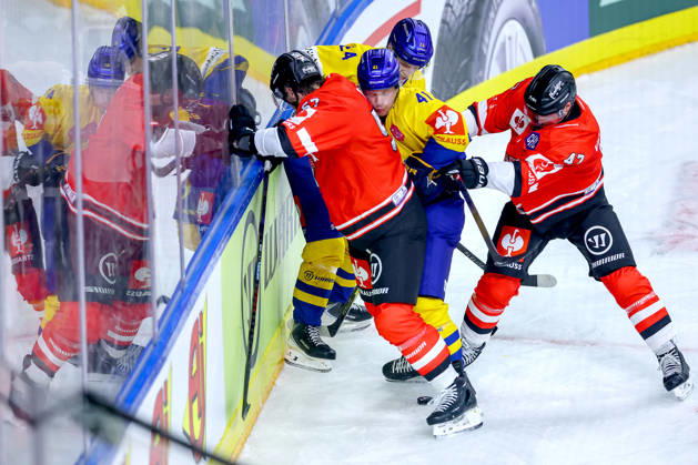 October 7, 2026, Ice Hockey, CHL, Kölner Haie vs. Blue Fox Herning, Champions Hockey League 2026–27, Matchday 5, 2026–27 Season, Lanxess Arena, Cologne: Brady Austin (Cologne Sharks, 57) and Veli Matti Vittasmäki (Cologne Sharks, 47) battle it out against Mads Skov Larsen (Blue Fox Herning, 41) and Lasse Baerentsen (Blue Fox Herning, 24) in North Rhine-Westphalia, Germany