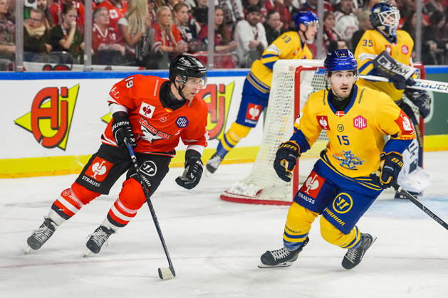 Ice Hockey CHL, Matchday 5: Kölner Haie vs. Herning Blue Fox on October 7, 2026, at the Lanxess Arena in Cologne. Frederik Storm (Cologne), left; Jared Kyle Dmytriw (Herning), right. xDMx