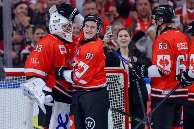 October 7, 2026, Ice Hockey, CHL, Kölner Haie vs. Blue Fox Herning, Champions Hockey League 2026–27, Matchday 5, 2026–27 Season, Lanxess Arena, Cologne: Celebrations after the 3–0 victory. Goalie Nico Wiens (Cologne Sharks 33) next to Mateu Späth (Cologne Sharks 81), North Rhine-Westphalia, Germany