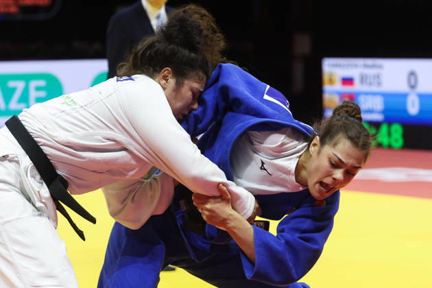 AZERBAIJAN, BAKU - OCTOBER 8, 2026: Madina Taimazova (L) of Russia and Aleksandra Andric of Serbia compete in their -70 kg bout as part of the 2026 World Judo Championships at the National Gymnastics Arena. Mikhail Sinitsyn TASS 98954383