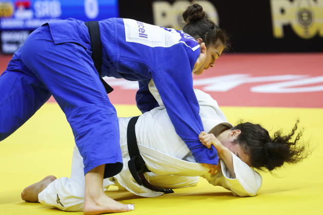AZERBAIJAN, BAKU - OCTOBER 8, 2026: Madina Taimazova (bottom) of Russia and Aleksandra Andric of Serbia compete in their -70 kg bout as part of the 2026 World Judo Championships at the National Gymnastics Arena. Mikhail Sinitsyn TASS 98954773