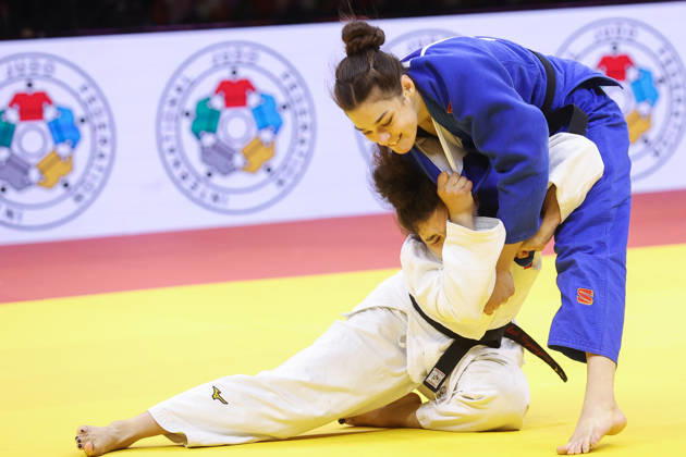 AZERBAIJAN, BAKU - OCTOBER 8, 2026: Madina Taimazova (bottom) of Russia and Aleksandra Andric of Serbia compete in their -70 kg bout as part of the 2026 World Judo Championships at the National Gymnastics Arena. Mikhail Sinitsyn TASS  98954973