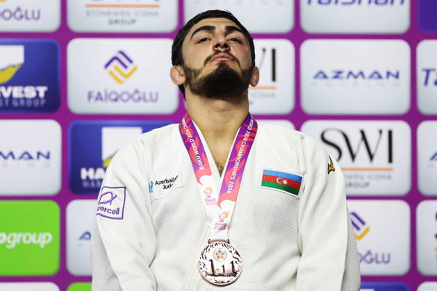 AZERBAIJAN, BAKU - OCTOBER 8, 2026: 3rd placed Murad Fatiyev of Azerbaijan poses during an award ceremony for the men s -90 kg category as part of the 2026 World Judo Championships at the National Gymnastics Arena. Mikhail Sinitsyn TASS  98956873