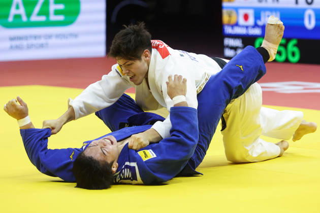 AZERBAIJAN, BAKU - OCTOBER 8, 2026: Sanshiro Murao (top) of Japan and Goki Tajima of Japan compete in their -90 kg bout as part of the 2026 World Judo Championships at the National Gymnastics Arena. Mikhail Sinitsyn TASS  98959055