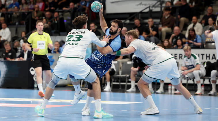 October 8, 2026, Stuttgart, Germany: Handball – TVB Stuttgart vs. HSG Wetzlar; from left: Marti Soler (Wetzlar), Mohamed Amine Darmoul (TVB), Petter Overby (Wetzlar)