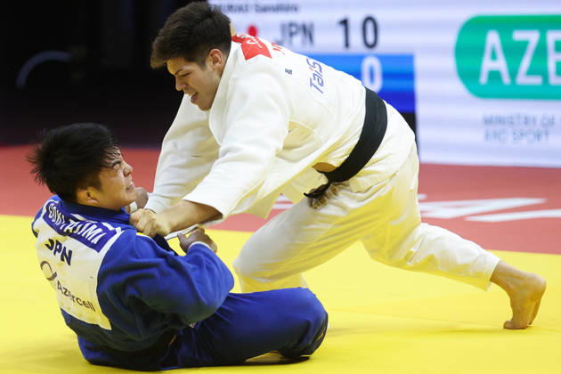 AZERBAIJAN, BAKU - OCTOBER 8, 2026: Sanshiro Murao (top) of Japan and Goki Tajima of Japan compete in their -90 kg bout as part of the 2026 World Judo Championships at the National Gymnastics Arena 2026 World Judo Championships In Baku  - ZUMAt113 20261008_zaa_t113_725 Copyright: xMikhailxSinitsynx