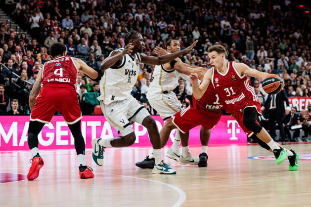 MUNICH, GERMANY - OCTOBER 08: Rokas Jokubaitis (FC Bayern Muenchen, 31) controls the ball against Aliou Diarra (Virtus Bologna, 31) during the Turkish Airlines EuroLeague match between FC Bayern Muenchen vs. Virtus Bologna at SAP Garden on round 4 of Turkish Airlines EuroLeague on October 08, 2026 in Munich, Germany. Bavaria Germany Copyright: xSteffiexWunderlx