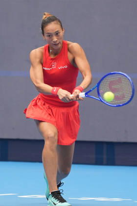 (261009) -- BEIJING, Oct. 9, 2026 -- Zheng Qinwen of China hits a return during the women s singles quarterfinal match between Zheng Qinwen of China and Elina Svitolina of Ukraine at 2026 China Open tennis tournament in Beijing, China, Oct. 9, 2026. ) (SP)CHINA-BEIJING-TENNIS-CHINA OPEN-WOMEN S SINGLES (CN) XiexHan