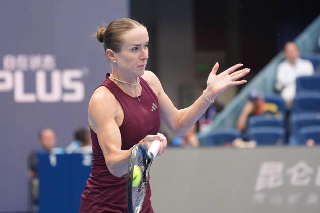 (261009) -- BEIJING, Oct. 9, 2026 -- Elina Svitolina of Ukraine hits a return during the women s singles quarterfinal match between Zheng Qinwen of China and Elina Svitolina of Ukraine at 2026 China Open tennis tournament in Beijing, China, Oct. 9, 2026. ) (SP)CHINA-BEIJING-TENNIS-CHINA OPEN-WOMEN S SINGLES (CN) XiexHan