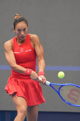(261009) -- BEIJING, Oct. 9, 2026 -- Zheng Qinwen of China hits a return during the women s singles quarterfinal match between Zheng Qinwen of China and Elina Svitolina of Ukraine at 2026 China Open tennis tournament in Beijing, China, Oct. 9, 2026. ) (SP)CHINA-BEIJING-TENNIS-CHINA OPEN-WOMEN S SINGLES (CN) XiexHan