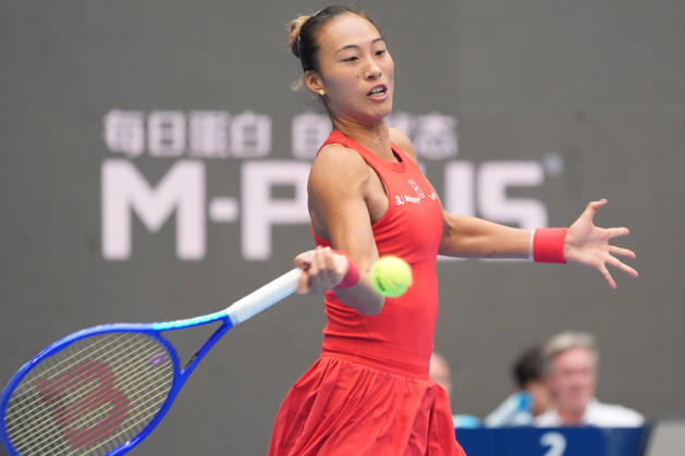 (261009) -- BEIJING, Oct. 9, 2026 -- Zheng Qinwen of China hits a return during the women s singles quarterfinal match between Zheng Qinwen of China and Elina Svitolina of Ukraine at 2026 China Open tennis tournament in Beijing, China, Oct. 9, 2026. ) (SP)CHINA-BEIJING-TENNIS-CHINA OPEN-WOMEN S SINGLES (CN) XiexHan