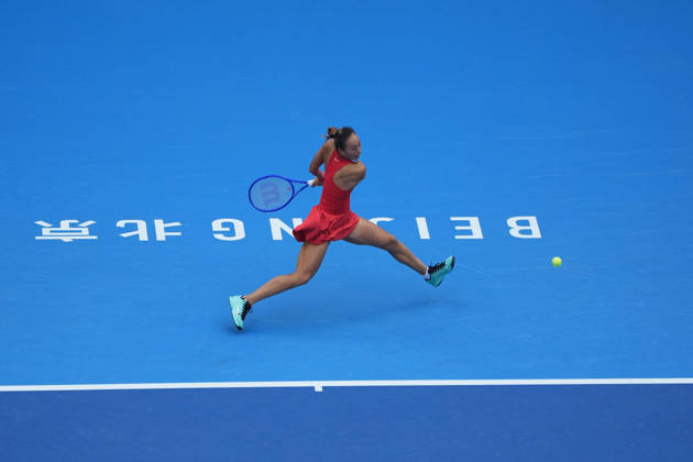 (261009) -- BEIJING, Oct. 9, 2026 -- Zheng Qinwen of China hits a return during the women s singles quarterfinal match between Zheng Qinwen of China and Elina Svitolina of Ukraine at 2026 China Open tennis tournament in Beijing, China, Oct. 9, 2026. ) (SP)CHINA-BEIJING-TENNIS-CHINA OPEN-WOMEN S SINGLES (CN) XiexHan