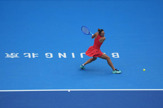 (261009) -- BEIJING, Oct. 9, 2026 -- Zheng Qinwen of China hits a return during the women s singles quarterfinal match between Zheng Qinwen of China and Elina Svitolina of Ukraine at 2026 China Open tennis tournament in Beijing, China, Oct. 9, 2026. ) (SP)CHINA-BEIJING-TENNIS-CHINA OPEN-WOMEN S SINGLES (CN) XiexHan