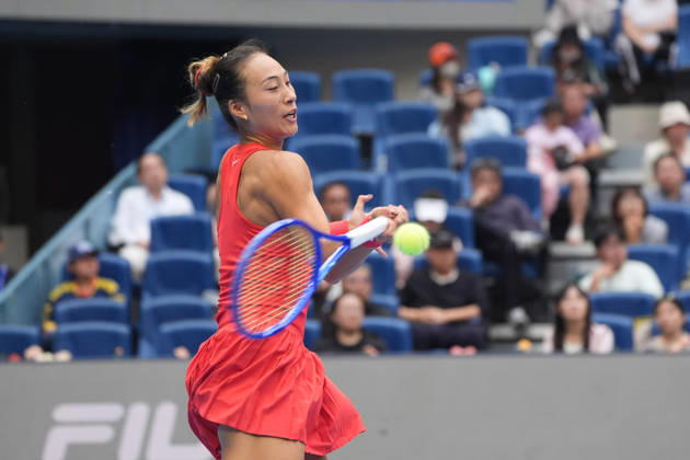(261009) -- BEIJING, Oct. 9, 2026 -- Zheng Qinwen of China hits a return during the women s singles quarterfinal match between Zheng Qinwen of China and Elina Svitolina of Ukraine at 2026 China Open tennis tournament in Beijing, China, Oct. 9, 2026. ) (SP)CHINA-BEIJING-TENNIS-CHINA OPEN-WOMEN S SINGLES (CN) XiexHan