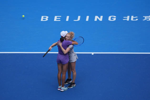 (261009) -- BEIJING, Oct. 9, 2026 -- Katerina Siniakova (R) Zhang Shuai celebrate after winning the women s doubles quarterfinal match between Katerina Siniakova (the Cezch Republic) Zhang Shuai (China) and Storm Hunter (Australia) Kristina Mladenovic (France) at 2026 China Open tennis tournament in Beijing, China, Oct. 9, 2026. ) (SP)CHINA-BEIJING-TENNIS-CHINA OPEN-WOMEN S DOUBLES (CN) XiexHan