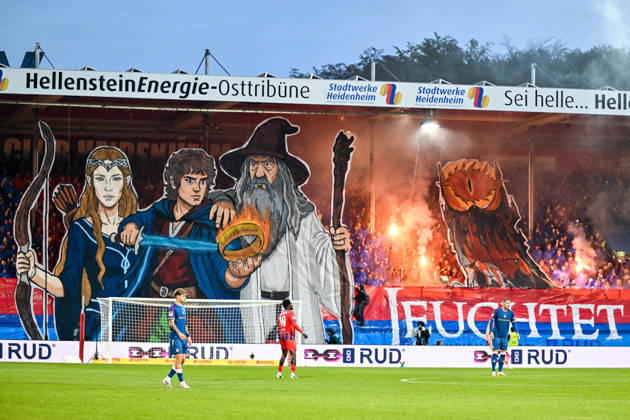 October 9, 2026, GER, Soccer, Men s, 2. Bundesliga, Matchday 7, 1 FC Heidenheim vs. 1 FC Kaiserslautern; choreography by Heidenheim fans, Ultras, East Stand; motif from *The Lord of the Rings*; pyrotechnics at Heidenheim s Voith Arena, Baden-Württemberg, Germany Copyright: xNordphotox xHafnerx