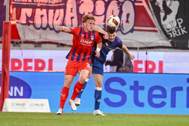 Mikkel Kaufmann of 1 FC Heidenheim 1846 and Jacob Rasmussen of 1 FC Kaiserslautern in a tackle during the 2. Bundesliga match between 1 FC Heidenheim and 1 FC Kaiserslautern, at the Voith Arena on October 9, 2026, in Heidenheim an der Brenz, Germany. Photo by Harry Langer, DeFodi Images. Mikkel Kaufmann of 1 FC Heidenheim 1846 and Jacob Rasmussen of 1 FC Kaiserslautern battle for the ball during the 2nd Bundesliga match between 1 FC Heidenheim and 1 FC Kaiserslautern at Voith Arena on October 9, 2026 in Heidenheim an der Brenz, Germany Photo by Harry Langer, DeFodi Images. DFB and DFL regulations prohibit any use of photographs as image sequences and or quasi-video. Photo by Harry Langer, DeFodi Images. DFB and DFL regulations prohibit any use of photographs as imSEQUENCES AND OR QUASI-VIDEO