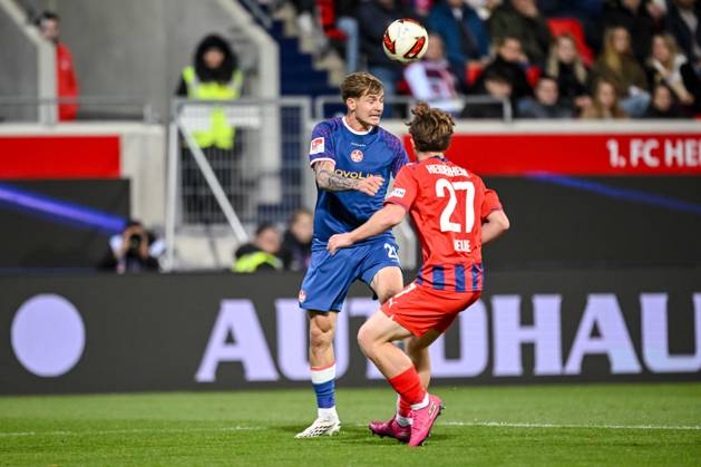 Paul Joly of 1 FC Kaiserslautern and Michael Heule of 1 FC Heidenheim 1846 go head-to-head during the 2. Bundesliga match between 1 FC Heidenheim and 1 FC Kaiserslautern, at the Voith Arena on October 9, 2026, in Heidenheim an der Brenz, Germany. Photo by Harry Langer, DeFodi Images. Paul Joly of 1 FC Kaiserslautern and Michael Heule of 1 FC Heidenheim 1846 battle for the ball during the 2nd Bundesliga match between 1 FC Heidenheim and 1 FC Kaiserslautern at Voith Arena on October 9, 2026 in Heidenheim an der Brenz, Germany Photo by Harry Langer, DeFodi Images. DFB and DFL regulations prohibit any use of photographs as image sequences and or quasi-video. Photo by Harry Langer, DeFodi Images. DFB and DFL regulations prohibit any use of photographs as imSEQUENCES AND OR QUASI-VIDEO