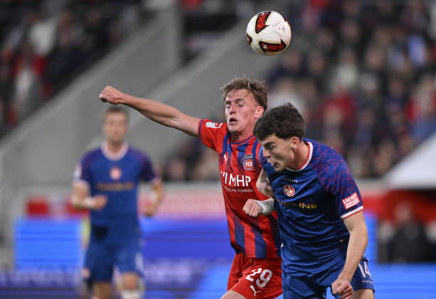 Heading duel, tackle, action: Mikkel Kaufmann (1 FC Heidenheim 1846, FCH 29) vs. Jacob Rasmussen (1 FC Kaiserslautern, FCK 14) 1 FC Heidenheim 1846 FCH vs. 1 FC Kaiserslautern 09 10 2026 DFL regulations prohibit any use of photographs as image sequences and or quasi-video. 1 FC Heidenheim 1846 FCH vs. 1 FC Kaiserslautern