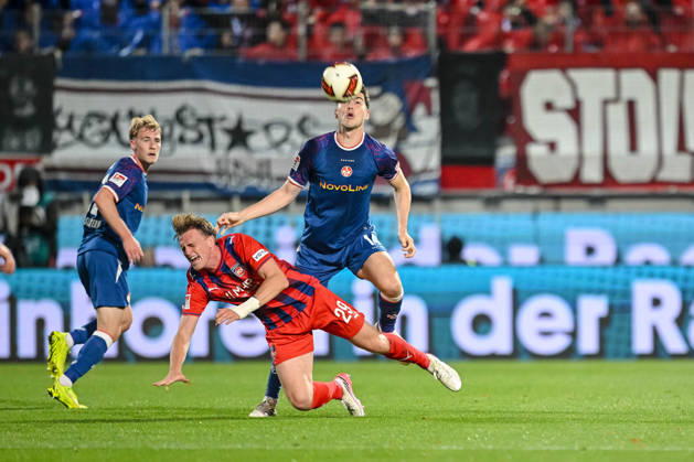 Mikkel Kaufmann of 1 FC Heidenheim 1846 and Jacob Rasmussen of 1 FC Kaiserslautern in a tackle during the 2. Bundesliga match between 1 FC Heidenheim and 1 FC Kaiserslautern, at the Voith Arena on October 9, 2026, in Heidenheim an der Brenz, Germany. Photo by Harry Langer, DeFodi Images. Mikkel Kaufmann of 1 FC Heidenheim 1846 and Jacob Rasmussen of 1 FC Kaiserslautern battle for the ball during the 2nd Bundesliga match between 1 FC Heidenheim and 1 FC Kaiserslautern at Voith Arena on October 9, 2026 in Heidenheim an der Brenz, Germany Photo by Harry Langer, DeFodi Images. DFB and DFL regulations prohibit any use of photographs as image sequences and or quasi-video. Photo by Harry Langer, DeFodi Images. DFB and DFL regulations prohibit any use of photographs as imSEQUENCES AND OR QUASI-VIDEO