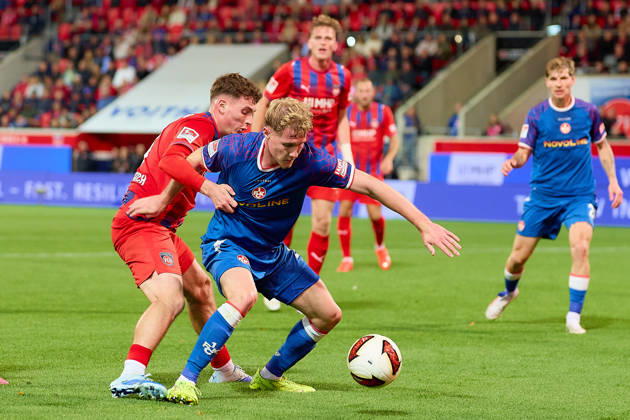 Head-to-head matchup between Paul Hennrich (1 FC Heidenheim, 08) and Mika Haas (1 FC Kaiserslautern, 22 GER), 1 FC Heidenheim 1846 vs. 1 FC Kaiserslautern, soccer, 2. Bundesliga, Matchday 7, 2026–2027 season, October 9, 2026 DFL regulations prohibit any use of photographs as image sequences and or quasi-video GER, 1 FC Heidenheim 1846 vs. 1 FC Kaiserslautern, soccer, 2. Bundesliga, Matchday 7, 2026–2027 season, October 9, 2026, Heidenheim an der Brenz Copyright: xEibner-Pressefoto GeraldxOelze-dexStoppanyx EP_ODS