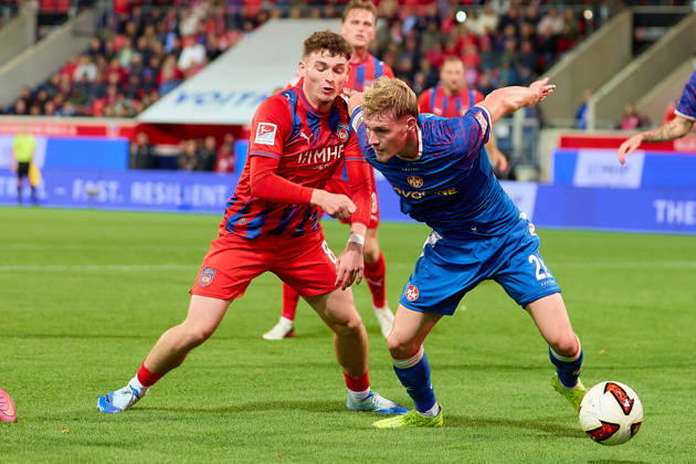 Head-to-head matchup between Paul Hennrich (1 FC Heidenheim, 08) and Mika Haas (1 FC Kaiserslautern, 22 GER), 1 FC Heidenheim 1846 vs. 1 FC Kaiserslautern, soccer, 2. Bundesliga, Matchday 7, 2026–2027 season, October 9, 2026 DFL regulations prohibit any use of photographs as image sequences and or quasi-video GER, 1 FC Heidenheim 1846 vs. 1 FC Kaiserslautern, soccer, 2. Bundesliga, Matchday 7, 2026–2027 season, October 9, 2026, Heidenheim an der Brenz Copyright: xEibner-Pressefoto GeraldxOelze-dexStoppanyx EP_ODS